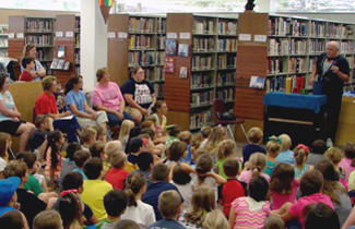 Magic show at the Cullman Library children and parents filling the room